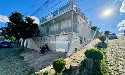 Casa com 3 quartos à venda na Rua Tucano, 505, Cruzeiro, Caxias do Sul por R$ 499.900