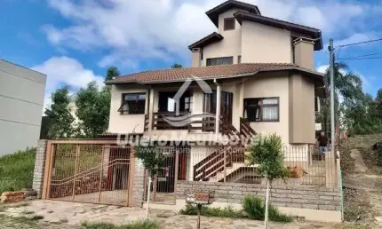 Casa com 3 quartos à venda na Doutor Luiz Mezzalira Filho, 459, Nossa Senhora da Saúde, Caxias do Sul por R$ 1.484.000