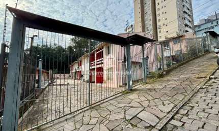 Casa em condomínio fechado com 3 quartos à venda na Rua Gilberto Candeia, 841, Colina Sorriso, Caxias do Sul por R$ 339.000