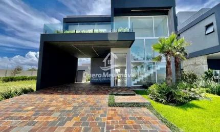 Casa em condomínio fechado com 4 quartos à venda na Ipanema, 1000, Curumim, Capão da Canoa por R$ 1.999.000