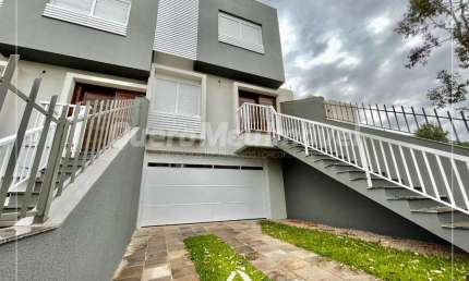 Casa com 3 quartos à venda na Rua Emma Vedana Palhosa, 144, Colina Sorriso, Caxias do Sul por R$ 750.000