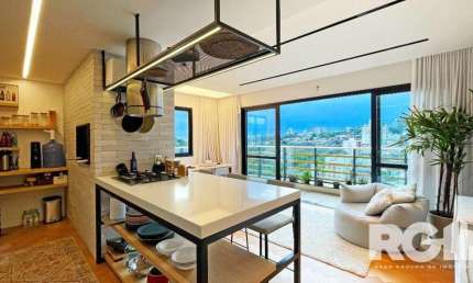 Apartamento de 72 m2 para alugar com 1 suíte, banheiro social com depósito e 2 vagas, finamente mobiliado e decorado.