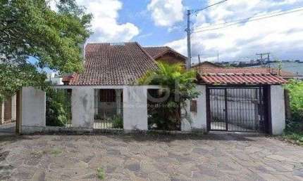 Casa com 3 quartos à venda na Rua Cangussu, 643, Nonoai, Porto Alegre