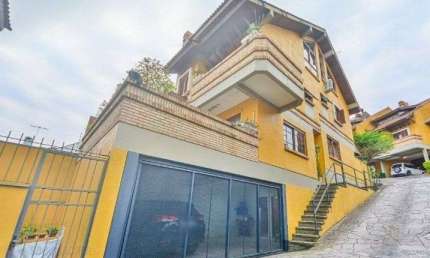 Casa com 3 quartos à venda na Rua Edgar Luiz Schneider, 120, Jardim Isabel, Porto Alegre