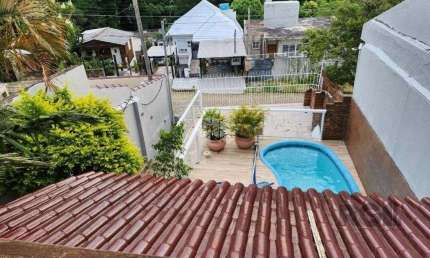 Casa com 3 quartos à venda na Rua Silvério Souto, 596, Teresópolis, Porto Alegre