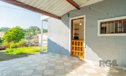 Casa com 3 quartos à venda na Rua Mathilde Zatar, 161, Nonoai, Porto Alegre