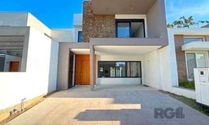Casa Condominio em Porto Alegre, no bairro Ipanema, com 3 dormitório(s), à venda.