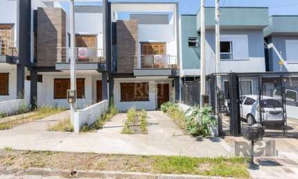 Casa com 3 quartos à venda na Rua Manoel Fernandes, 136, Guarujá, Porto Alegre