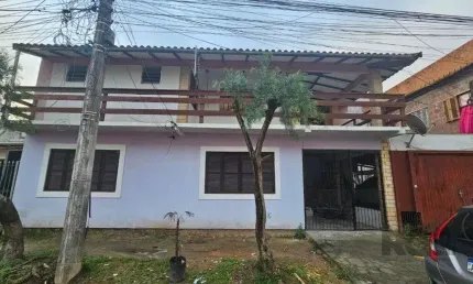 Casa com 3 quartos à venda na Rua Hesiodo Andrade, 336, Hípica, Porto Alegre