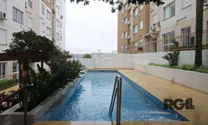 Apartamento no Urbano Menino Deus de 1 dormitório vaga e pátio