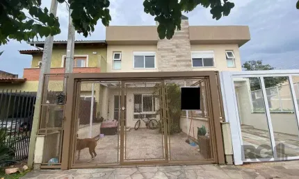 Casa com 3 quartos à venda na Rua Manacá, 124, Hípica, Porto Alegre