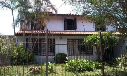 Casa com 4 quartos à venda na Rua Manoel Leão, 109, Pedra Redonda, Porto Alegre