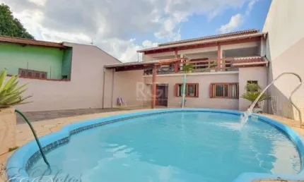 Ótima casa com 5 dormitórios no bairro Rio Branco em Canoas