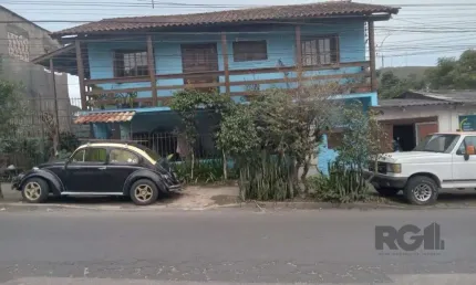 Casa com 3 quartos, vaga de garagem, churrasqueira, no bairro Partenon, Porto Alegre/RS
