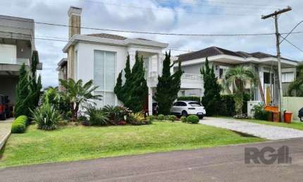 Casa em condomínio fechado com 4 quartos à venda na Avenida Central, 2578, Atlântida, Xangri-Lá