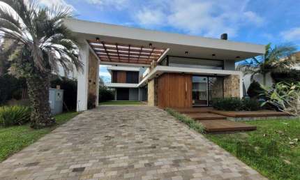 Casa em condomínio fechado com 4 quartos à venda na Avenida Jaçanã, 1028, Atlântida, Xangri-Lá