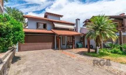 Casa com 4 quartos à venda na Rua Manoel Cabeda Perez, 122, Jardim Isabel, Porto Alegre
