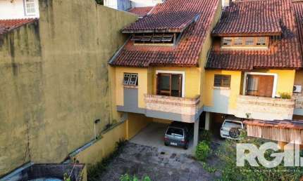 Casa em condomínio fechado com 3 quartos à venda na Rua Edgar Luiz Schneider, 127, Jardim Isabel, Porto Alegre