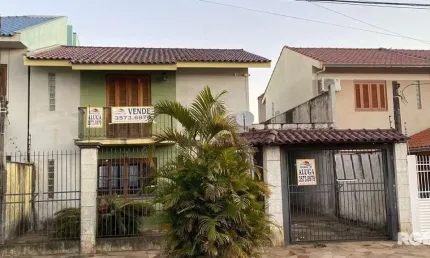 Casa à venda na Rua Martinho Lutero, localizada no bairro Harmonia em Canoas, RS.