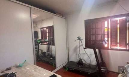 Casa em condomínio fechado com 3 quartos à venda na Avenida Edgar Pires de Castro, 1349, Hípica, Porto Alegre