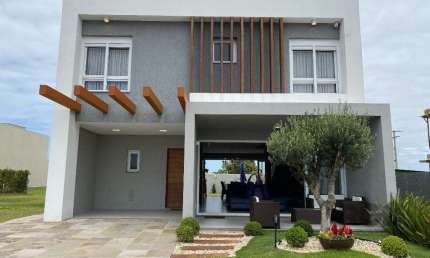 Casa em condomínio fechado com 4 quartos à venda na Rua Rio Divisa, 94, Atlântida, Xangri-Lá