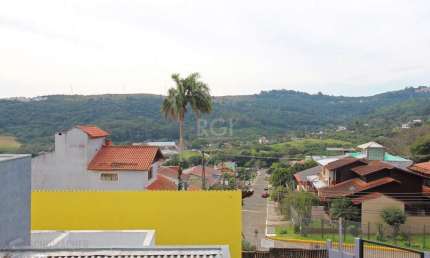 Casa para Venda - 339m², 3 dormitórios, 2 vagas - Vila Nova, Porto Alegre