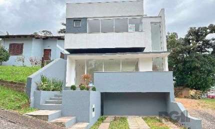 Casa Condominio em Porto Alegre, no bairro Hípica, com 3 dormitório(s), à venda.