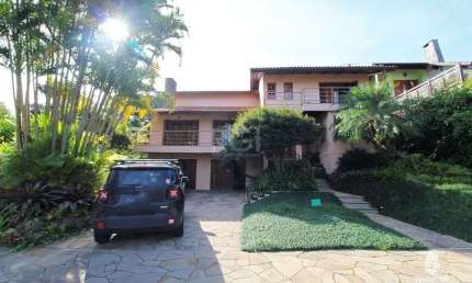 Casa Para comprar com 5 Dormitórios à venda, 420 m²-Cavalhada - Porto Alegre/RS