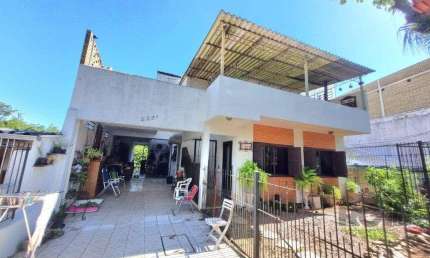 Casa com 5 quartos à venda na Avenida Vicente Monteggia, 2281, Cavalhada, Porto Alegre