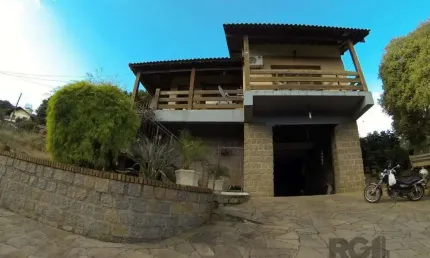 Casa com 3 quartos à venda na Rua Ida Passuello, 2570, Vila Nova, Porto Alegre