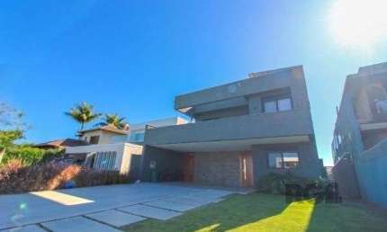 Casa Condominio em Porto Alegre, no bairro Belém Novo, com 4 dormitório(s), e 4 banheiros, à venda.