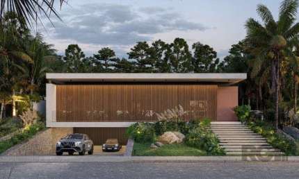 A casa conta com 434m2 de área construída, mas com um aproveitamento total dos 1.012m2 do lote