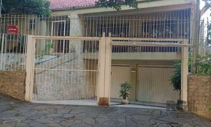 Casa com 3 quartos à venda na Rua Fagundes Varela, 238, Santo Antônio, Porto Alegre