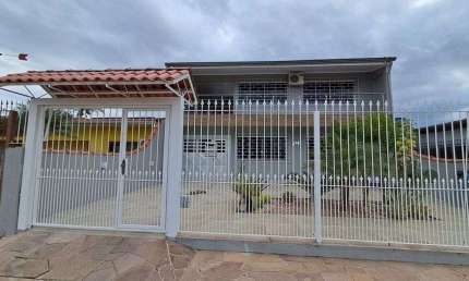 Casa com 3 quartos à venda na Rua Gaspar Martins, 979, Americana, Alvorada