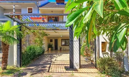 Casa com 4 quartos à venda na Rua Claudio da Silva Pinto, 339, Espírito Santo, Porto Alegre
