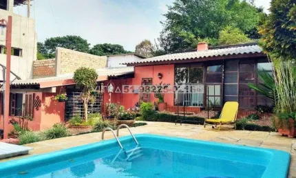Casa com 6 quartos à venda na Avenida Arnaldo Bohrer, 259, Teresópolis, Porto Alegre