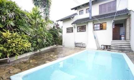 Casa 3 dormitórios à venda no Bairro Parque Santa Fé - Porto Alegre