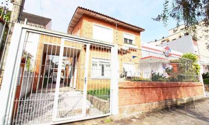 Casa à venda 4 quartos (dormitórios), suíte, 3 vagas - Partenon, Porto Alegre