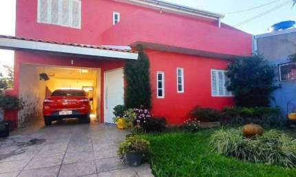 Casa com 6 quartos à venda na Rua Natal Fagundes, 113, Restinga, Porto Alegre