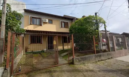Casa com 4 quartos à venda na Rua Doutor Cláudio Walter Ferreira da Silva, 268, Guarujá, Porto Alegre