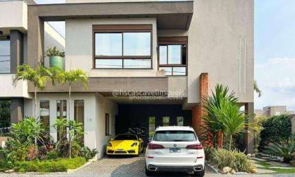 SOBRADO COM 4 SUITES MOBILIADO EM CONDOMINIO FECHADO