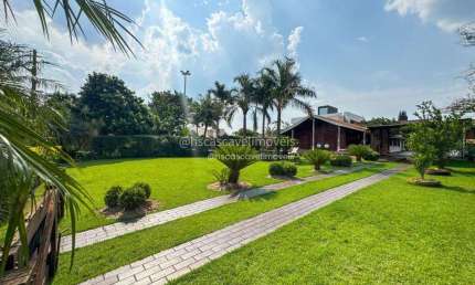 Casa com 2 Suítes + 2 dormitórios à venda, 200 m² por R$ 710.000 - Centro - Santa Helena/PR