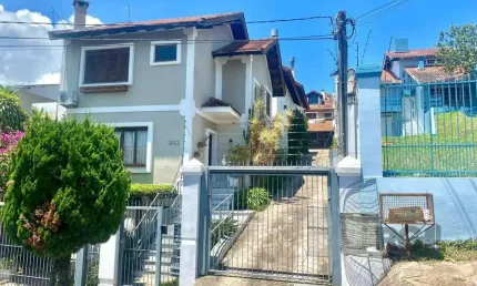Casa em condomínio fechado com 3 quartos à venda na Rua Padre João Batista Reus, 2083, Vila Conceição, Porto Alegre