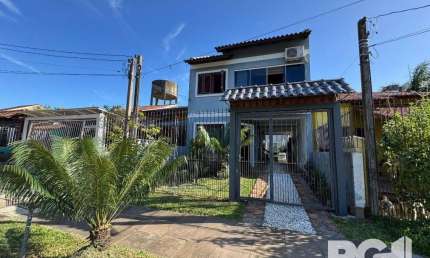 Casa com 3 quartos à venda na Rua Baldoino Bottini, 733, Hípica, Porto Alegre