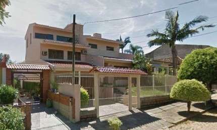 Casa com 3 quartos à venda na Rua Professor Henrique Desjardins, 308, Espírito Santo, Porto Alegre