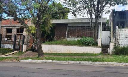 Casa com 2 quartos à venda na Rua Carlos Huber, 755, Três Figueiras, Porto Alegre