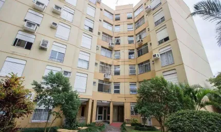 Apartamento de 1 dormitório, living, cozinha, área de serviço e banheiro social.