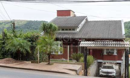 Casa com 4 quartos à venda na Estrada Gedeon Leite, 2590, Hípica, Porto Alegre