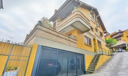 Casa com 3 quartos à venda na Rua Edgar Luiz Schneider, 54, Jardim Isabel, Porto Alegre