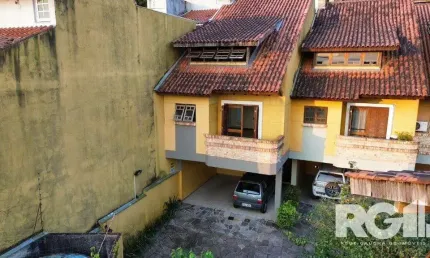 Casa em condomínio fechado com 3 quartos à venda na Rua Edgar Luiz Schneider, 54, Jardim Isabel, Porto Alegre